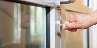a homeowner struggling with a key that won't turn in the lock